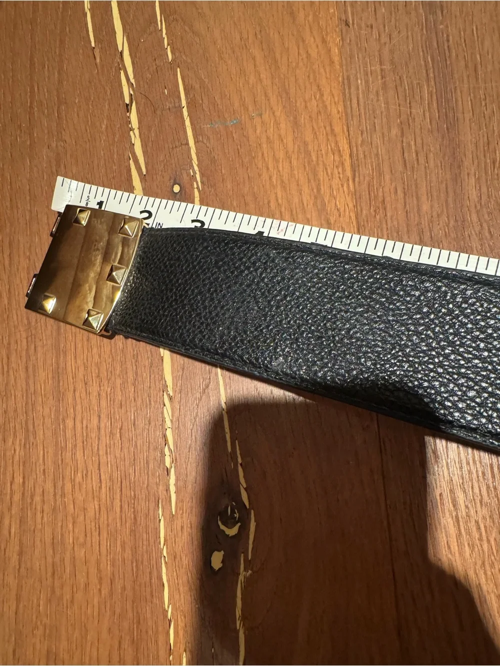 BCBG Black Faux Leather Belt with Gold Pyramid Stud Buckle. 34” long.